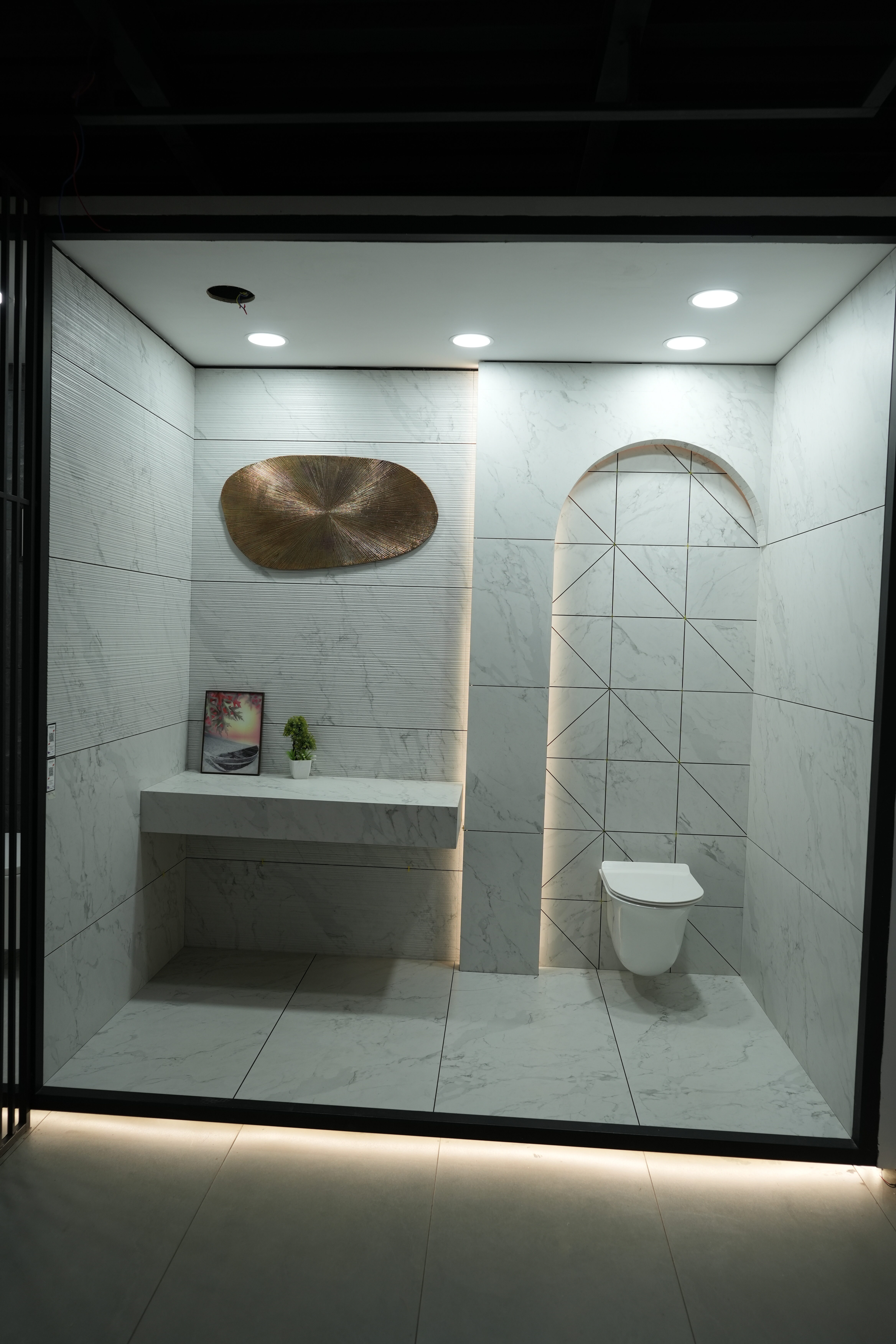 Creanza bathroom wall and floor tiles with modern designs in Thrissur showroom