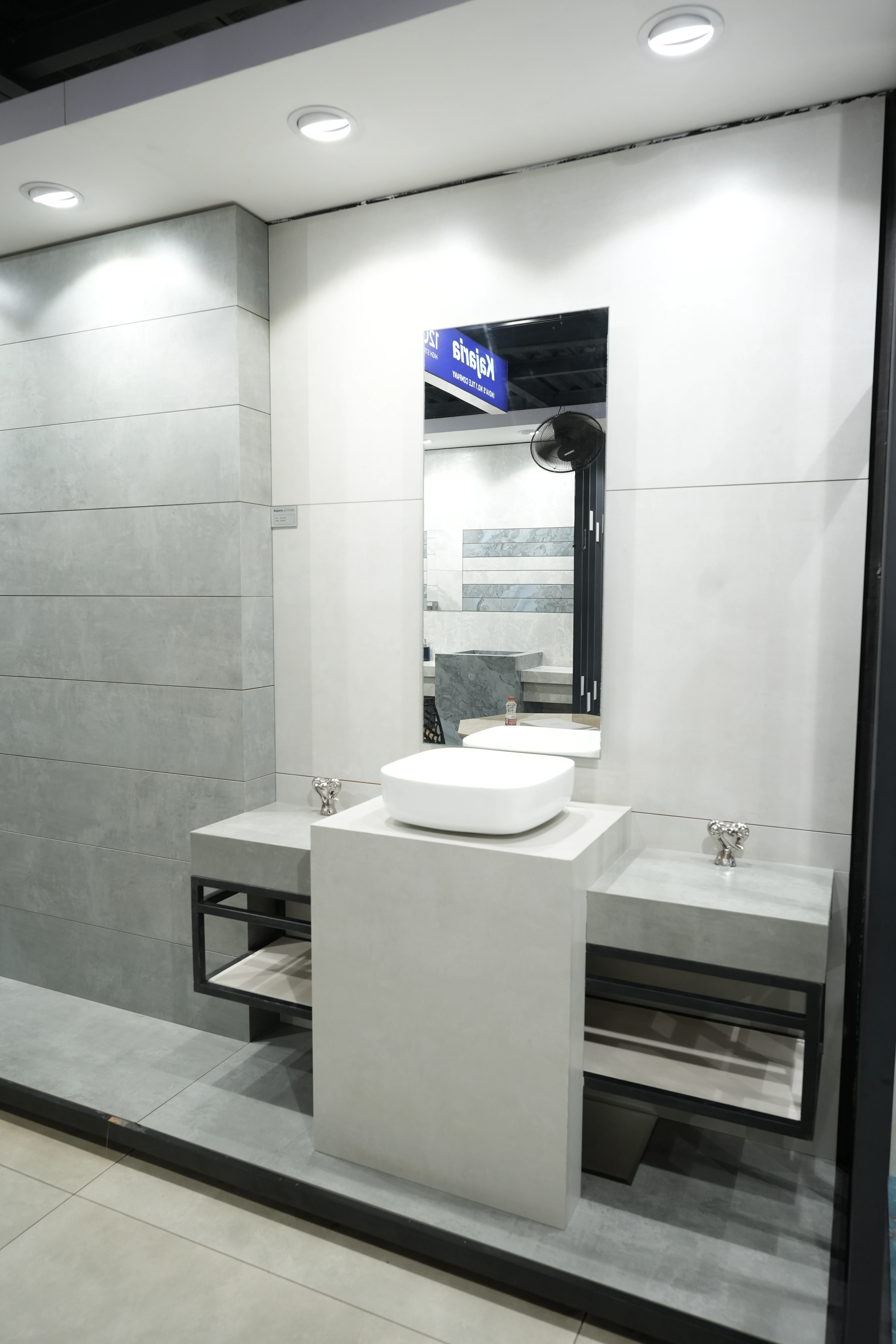 City Ceramics showroom featuring Kajaria tiles with modern bathroom and sanitaryware displays, showcasing stylish tiles and contemporary fixtures.